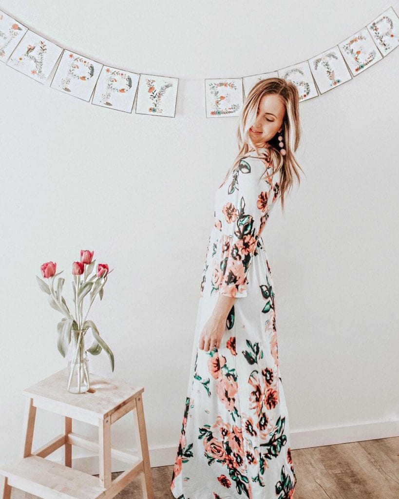 Stesha (@stesharose), family and fashion blogger and trend setter, in a beautiful floor length, sleeved, floral dress